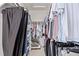 Spacious walk-in closet providing ample storage with organized shelving and hanging racks at 20710 E Princeton Pl, Aurora, CO 80013