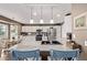 Beautiful kitchen featuring stainless steel appliances, granite counters, and casual seating at 20710 E Princeton Pl, Aurora, CO 80013