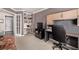 Well-designed office space with built-in shelving, dual desks, and ample workspace at 20710 E Princeton Pl, Aurora, CO 80013