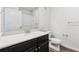 Bathroom featuring a vanity with solid surface countertops and a shower at 485 Interlocken Blvd # 201, Broomfield, CO 80021
