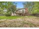 A spacious backyard with a deck and stairs leading down to the grass at 1800 Centaur Village Dr, Lafayette, CO 80026