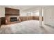 Basement area with a fireplace, carpeted floor, and natural light from a small window at 1800 Centaur Village Dr, Lafayette, CO 80026