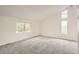 Bright bedroom with ample natural light from a large window and plush carpeting at 1800 Centaur Village Dr, Lafayette, CO 80026