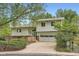 Charming two-story home with a well-maintained lawn and an attached garage at 1800 Centaur Village Dr, Lafayette, CO 80026