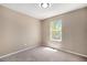 Small bedroom with carpet, natural light, and simple design at 817 Pintail Ave, Brighton, CO 80601