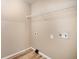 Laundry room with washer and dryer hookups, practical for chores at 817 Pintail Ave, Brighton, CO 80601