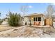 Charming single-story home with a covered porch and inviting curb appeal at 1920 Ulster St, Denver, CO 80220