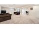 Open basement area featuring neutral carpet, recessed lighting, and living/office space at 21585 E Powers Cir, Centennial, CO 80015