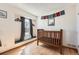Well-lit Bedroom with hardwood floors and window bench at 21585 E Powers Cir, Centennial, CO 80015