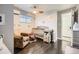 This Bedroom is filled with natural light from the window and features a crib and glider at 673 W Belleview Ave, Englewood, CO 80110