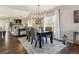 Open concept dining room features hardwood floors and bright natural lighting at 1345 Laurel St, Broomfield, CO 80020