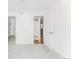 Bedroom features neutral carpet and a connecting door to the kitchen at 2727 Folsom St # 210, Boulder, CO 80304