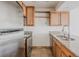 Updated kitchen features stainless steel appliances, granite countertops, and wood cabinets at 2727 Folsom St # 210, Boulder, CO 80304