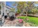Lush backyard with a patio, dining set, and plenty of space for outdoor activities and relaxation at 15432 Greenstone Cir, Parker, CO 80134