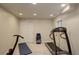 Finished basement featuring gym equipment and neutral carpet at 15432 Greenstone Cir, Parker, CO 80134