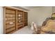 Office featuring wooden shelving unit and desk area with chair at 15432 Greenstone Cir, Parker, CO 80134