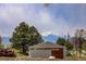 View of outbuilding with an mountain backdrop at 15432 Greenstone Cir, Parker, CO 80134