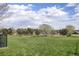 Well-maintained community park with open grass and walking paths at 15432 Greenstone Cir, Parker, CO 80134