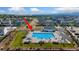 Aerial view of the community pool and surrounding neighborhood at 113 Marlowe Dr, Erie, CO 80516