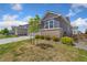Charming two-story home with a two-car garage and a well-maintained lawn at 113 Marlowe Dr, Erie, CO 80516