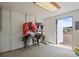 Barn showing storage area for saddles, an open door, and surrounding field at 43097 Taos Trl, Elizabeth, CO 80107