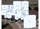 Detailed floor plan showcasing the home's layout, including bedrooms, bathrooms, kitchen, and living spaces at 43097 Taos Trl, Elizabeth, CO 80107