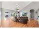 Bright living room with high vaulted ceilings, hardwood floors, and a cozy fireplace at 43097 Taos Trl, Elizabeth, CO 80107