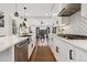 Bright kitchen with stainless steel appliances, stylish countertops, and open layout at 4467 King St, Denver, CO 80211