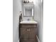 Modern bathroom with a double vanity and updated fixtures at 1818 S Quebec Way # 11-8, Denver, CO 80231