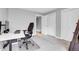 Home office with a desk and chair, and ample closet space at 1818 S Quebec Way # 11-8, Denver, CO 80231