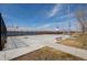 Well-maintained outdoor basketball court near the water, perfect for recreational activities and sports at 747 Mockingbird St, Brighton, CO 80601
