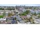 Aerial view of neighborhood featuring well-maintained homes and the Denver skyline at 1414 W Nevada Pl, Denver, CO 80223
