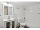 Sparkling bathroom with white vanity, updated fixtures, and a combined tub and shower at 14700 E Kentucky Dr # 524, Aurora, CO 80012