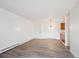 A bright and airy living room featuring modern laminate floors at 14700 E Kentucky Dr # 524, Aurora, CO 80012