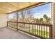 Outdoor patio with views of trees, grass, and foliage at 14700 E Kentucky Dr # 524, Aurora, CO 80012