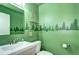 Charming bathroom with forest-themed wall decor at 1370 S Idalia St # C, Aurora, CO 80017