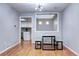 Bright dining room with hardwood floors and a view of the kitchen at 1370 S Idalia St # C, Aurora, CO 80017