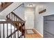 Entryway with hardwood floors, stairs and coat rack at 1370 S Idalia St # C, Aurora, CO 80017