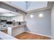 Bright kitchen with granite countertops and white cabinets at 1370 S Idalia St # C, Aurora, CO 80017