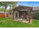 Backyard patio with pergola and seating area at 3131 S Leyden St, Denver, CO 80222