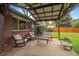 Backyard patio with covered pergola and seating at 3131 S Leyden St, Denver, CO 80222