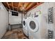 Basement laundry room with washer and dryer at 3131 S Leyden St, Denver, CO 80222