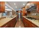 Modern kitchen with granite countertops and stainless steel appliances at 3131 S Leyden St, Denver, CO 80222