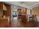 Modern kitchen with granite countertops and island at 3131 S Leyden St, Denver, CO 80222