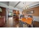 Kitchen boasts granite countertops, modern appliances, and an adjacent dining area at 3131 S Leyden St, Denver, CO 80222