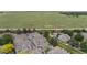 Aerial view of the condo community, showcasing the lush greenery and surrounding landscape at 7453 Singing Hills Dr, Boulder, CO 80301