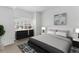 Serene bedroom featuring a comfortable bed, large window, and stylish décor at 7453 Singing Hills Dr, Boulder, CO 80301