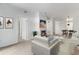 Bright living room with cozy fireplace and neutral décor offers a welcoming atmosphere at 7453 Singing Hills Dr, Boulder, CO 80301
