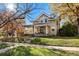 Two-story home with a classic facade and beautiful landscaping at 1825 Albion St, Denver, CO 80220