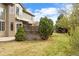Lush green backyard featuring mature trees and privacy fence, creating a serene outdoor space at 9743 Las Colinas Dr, Lone Tree, CO 80124